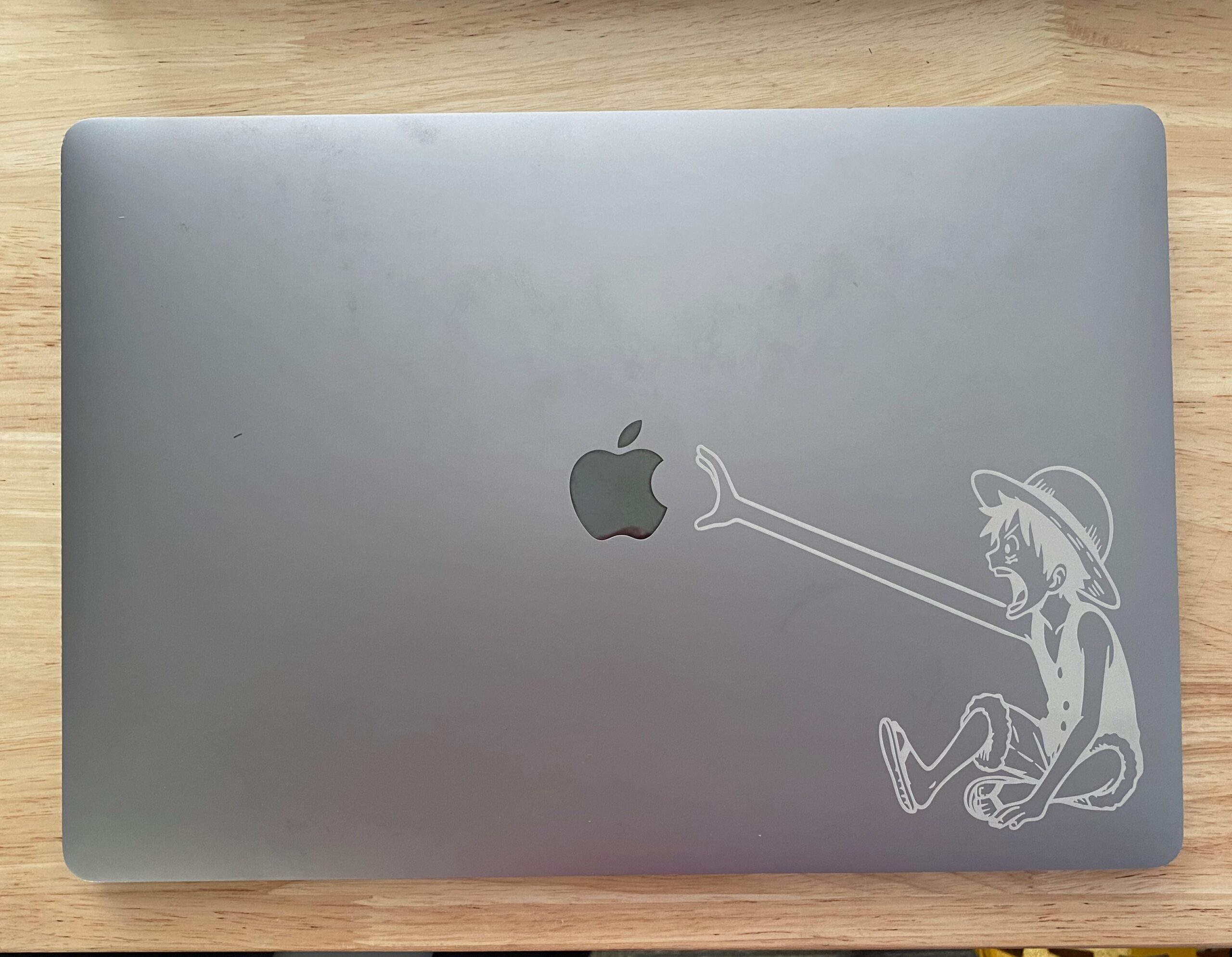 Laser engraving a laptop cover with an anime character is certainly a nice touch of personalization.